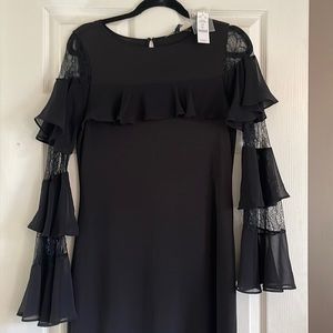 NWT White House black market dress. Fun lace and ruffle sleeves.
